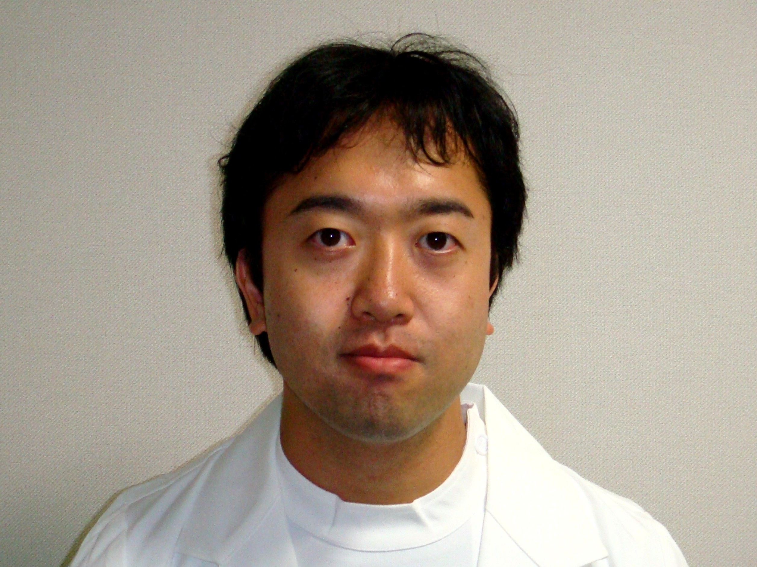 間野 真也